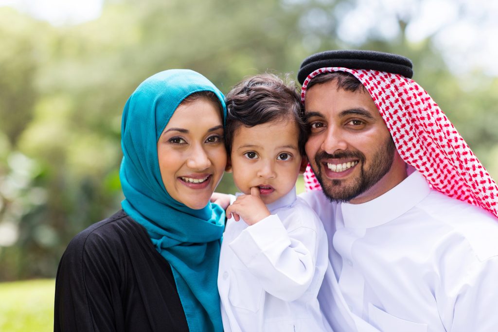 modern young Arabian family portrait outdoors