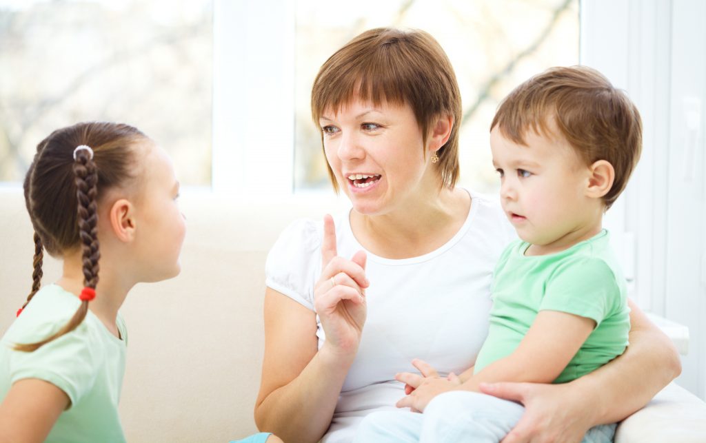 mother-talking-to-children
